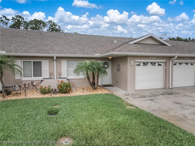 ranch-style home with stucco siding, roof with shingles, a front yard, an attached garage, and concrete driveway