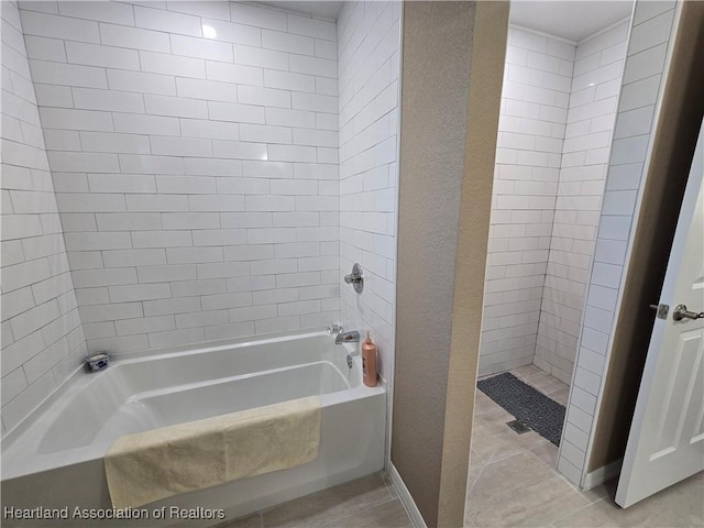 bathroom with tile patterned floors