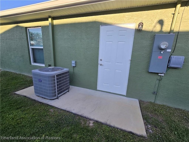 property entrance with central air condition unit