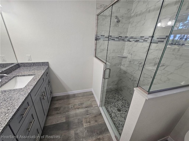 1703 N Morningside Rd, Avon Park, FL 33825 - bathroom with a shower stall, vanity, and baseboards
