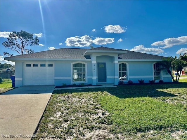 ranch-style house with stucco siding, a shingled roof, concrete driveway, a front yard, and an attached garage