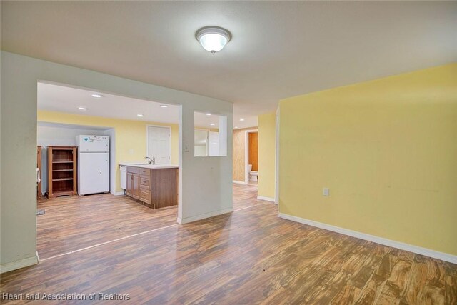 interior space featuring light hardwood / wood-style floors and sink