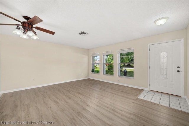 4304 Lewis Ave, Sebring, FL 33875 - foyer entrance with wood finished floors and ceiling fan