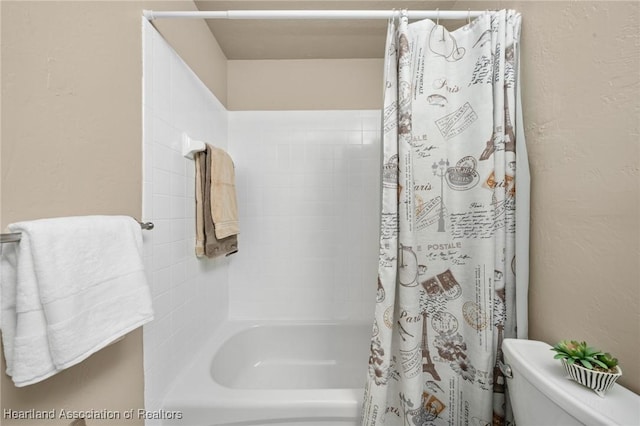 4304 Lewis Ave, Sebring, FL 33875 - bathroom with shower / bath combo with shower curtain and a textured wall
