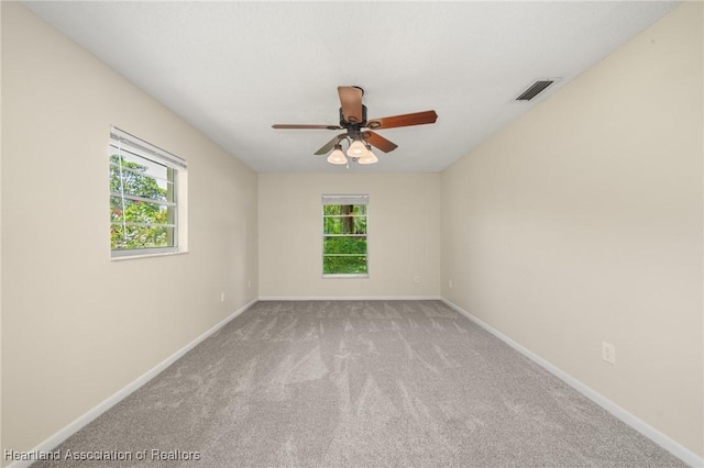 4304 Lewis Ave, Sebring, FL 33875 - carpeted empty room with ceiling fan and plenty of natural light