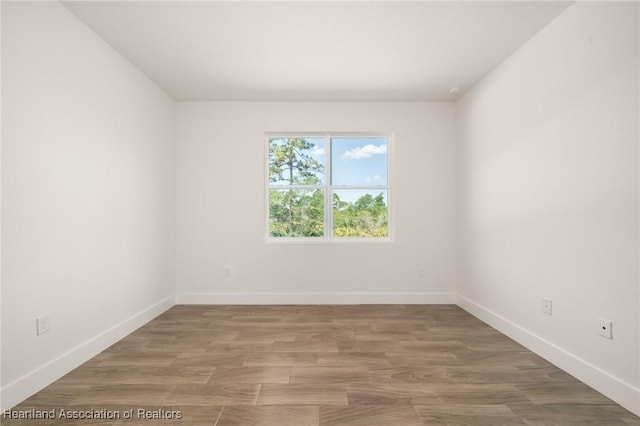 5243 Cortez Blvd, Sebring, FL 33872 - spare room with baseboards and light wood-style flooring