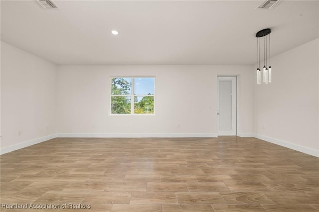 5243 Cortez Blvd, Sebring, FL 33872 - spare room featuring light wood-style flooring, baseboards, and recessed lighting