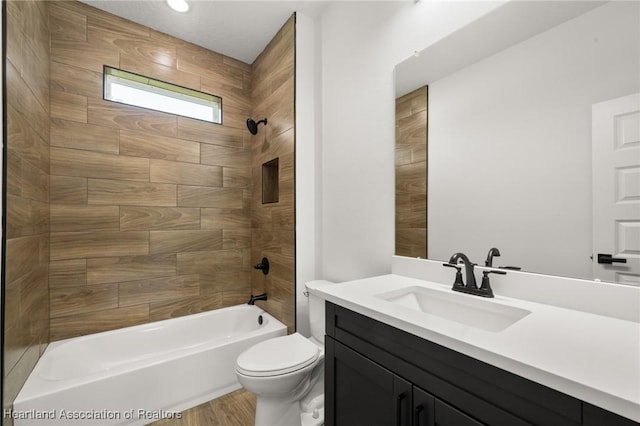 5243 Cortez Blvd, Sebring, FL 33872 - bathroom with toilet,  shower combination, vanity, and wood finished floors