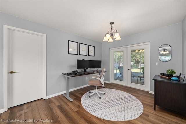 office featuring hardwood / wood-style floors, an inviting chandelier, and french doors