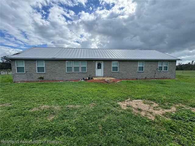 view of front of house with a front lawn