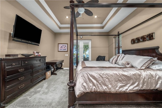 500 Heartland Blvd, Lake Placid, FL 33852 - bedroom with light carpet, ornamental molding, a tray ceiling, and baseboards