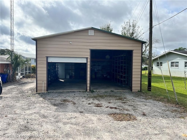 garage with a lawn