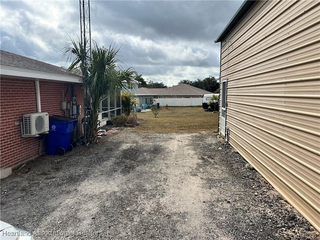 view of yard featuring ac unit