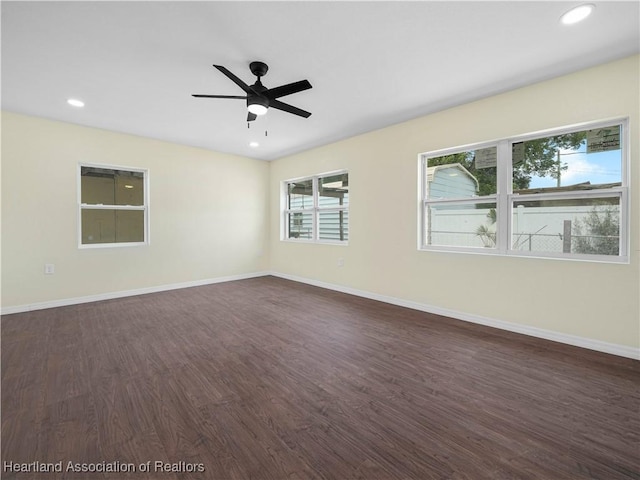 804 S 8th Ave, Wauchula, FL 33873 - spare room with dark wood-style flooring, baseboards, ceiling fan, and recessed lighting