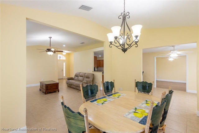 3108 Oakmont Dr, Avon Park, FL 33825 - dining room with ceiling fan with notable chandelier, light tile patterned floors, lofted ceiling, and visible vents