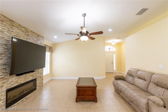 3108 Oakmont Dr, Avon Park, FL 33825 - living room with a wealth of natural light, a fireplace, visible vents, and a ceiling fan