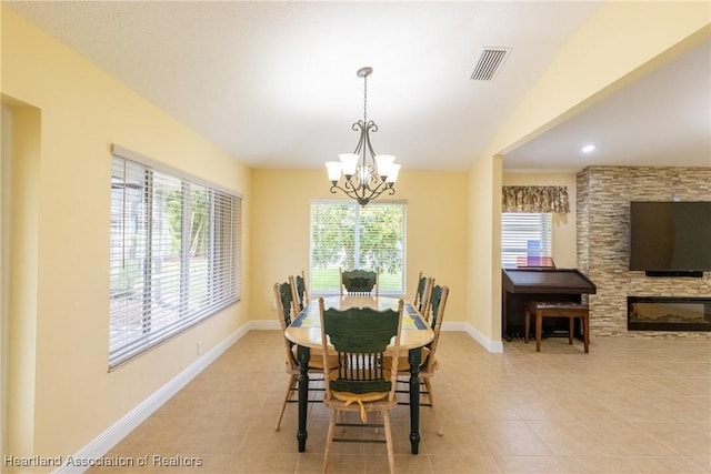 3108 Oakmont Dr, Avon Park, FL 33825 - dining area with a chandelier, a wealth of natural light, and visible vents