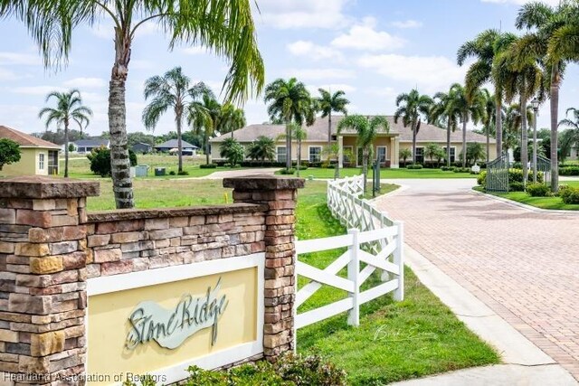1624 Marble St, Sebring, FL 33870 - community / neighborhood sign featuring a residential view and decorative driveway