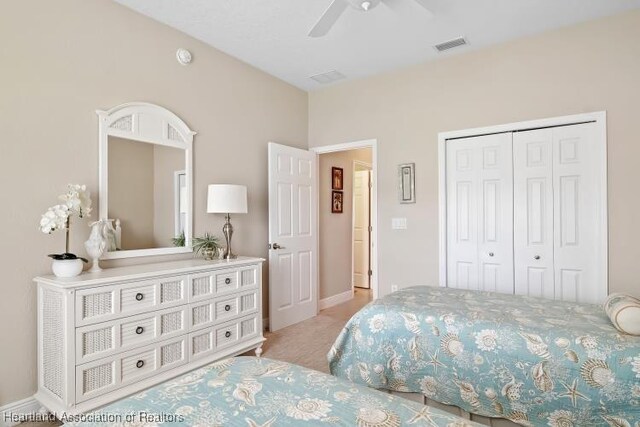 1624 Marble St, Sebring, FL 33870 - bedroom with light colored carpet, a closet, and a ceiling fan