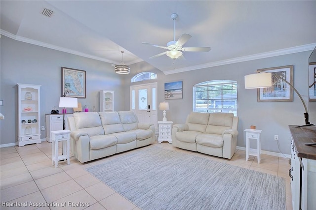 living room with visible vents, crown molding, baseboards, and light tile patterned floors