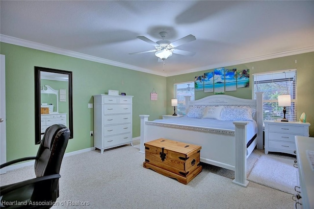 bedroom featuring carpet floors, baseboards, ornamental molding, and ceiling fan