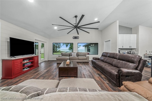 living area with lofted ceiling, dark wood-type flooring, recessed lighting, and baseboards