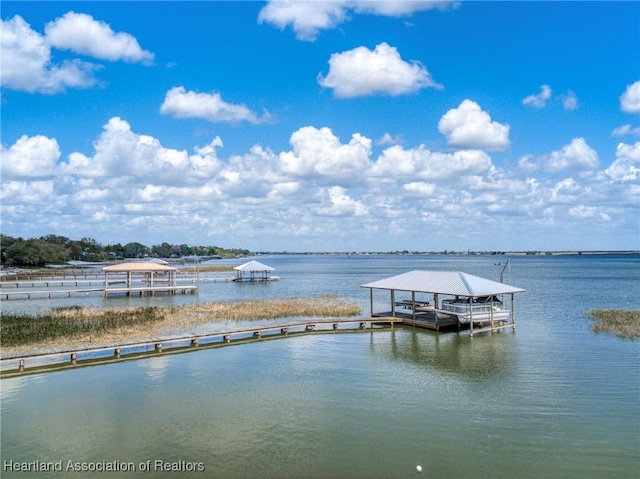 view of dock with a water view