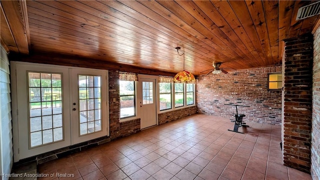 unfurnished sunroom with french doors