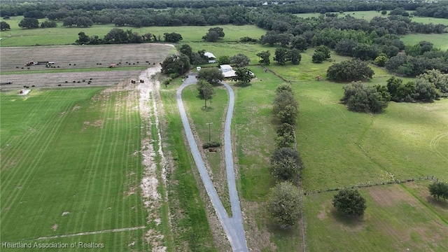 aerial view of property's location featuring rural landscape and a pastoral area