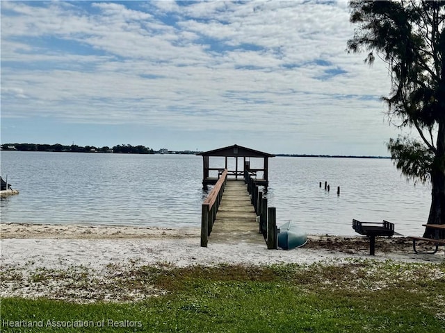 view of dock with a water view