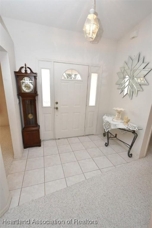 view of tiled foyer entrance