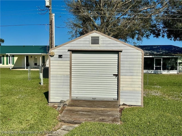 view of outdoor structure featuring a yard