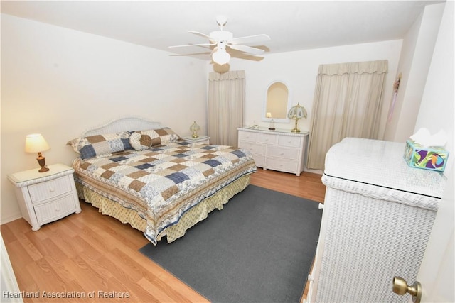 bedroom featuring ceiling fan and wood-type flooring