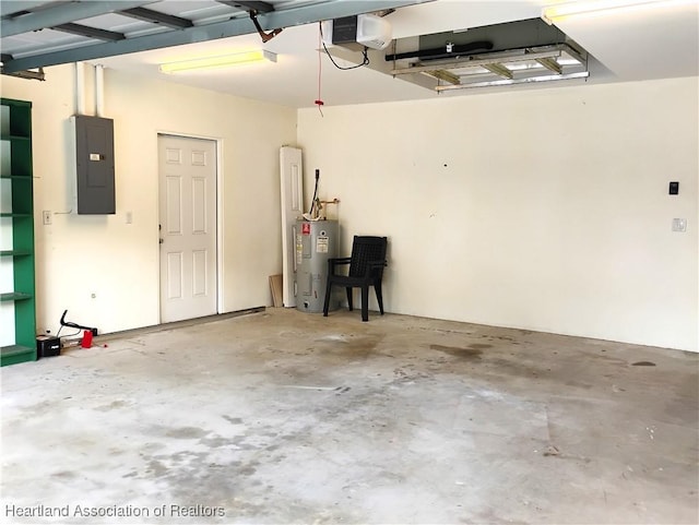 334 Sunshine Ave, Lake Placid, FL 33852 - garage with electric panel, water heater, and a garage door opener