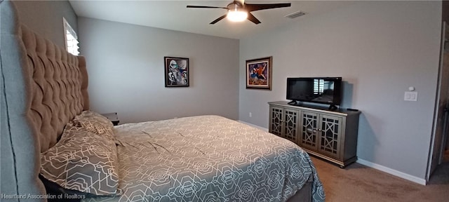 carpeted bedroom featuring ceiling fan