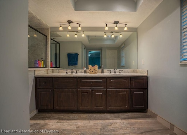 bathroom featuring vanity and walk in shower