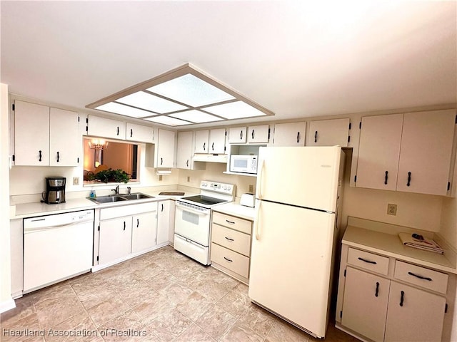 4620 Lafayette Ave, Sebring, FL 33875 - kitchen with a sink, light countertops, white appliances, under cabinet range hood, and stone finish flooring