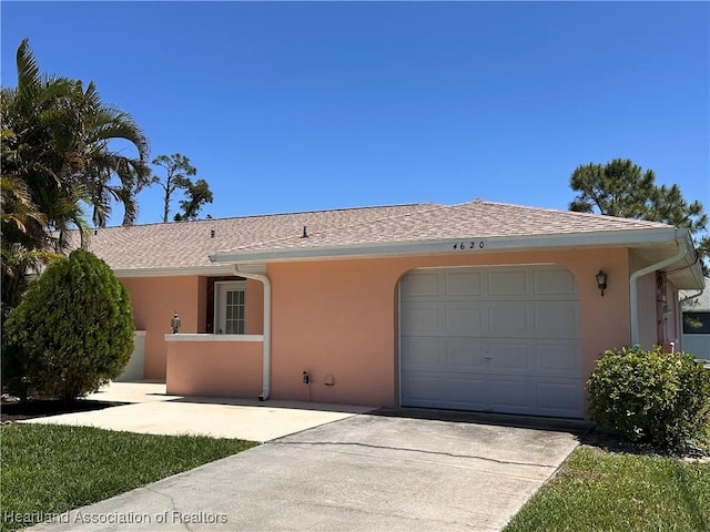 4620 Lafayette Ave, Sebring, FL 33875 - ranch-style home with an attached garage, driveway, and stucco siding