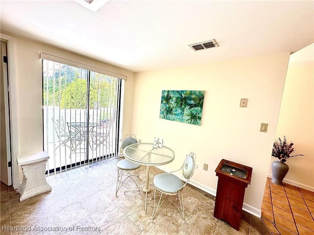 4620 Lafayette Ave, Sebring, FL 33875 - dining area featuring baseboards and visible vents