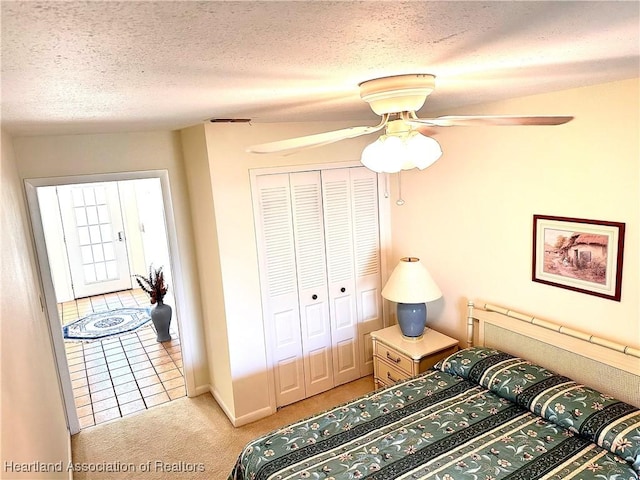 4620 Lafayette Ave, Sebring, FL 33875 - bedroom featuring a textured ceiling, a closet, light colored carpet, visible vents, and baseboards