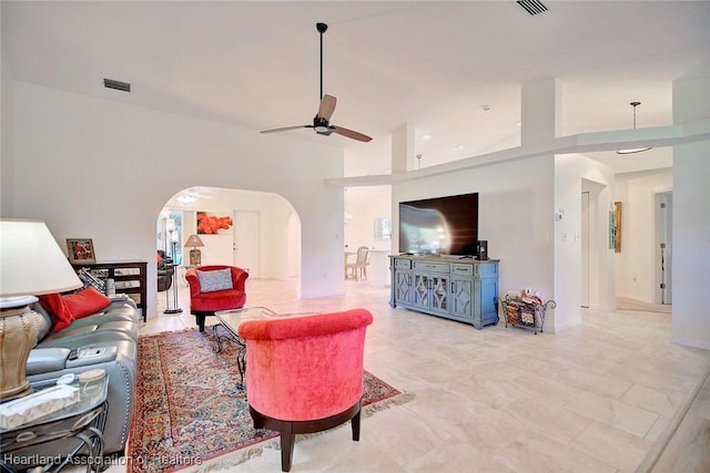 living room featuring ceiling fan