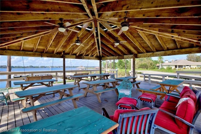 dock area with a gazebo and a water view