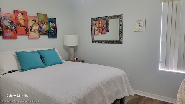 bedroom featuring hardwood / wood-style floors