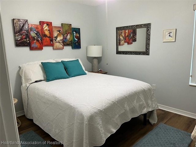 bedroom featuring hardwood / wood-style flooring