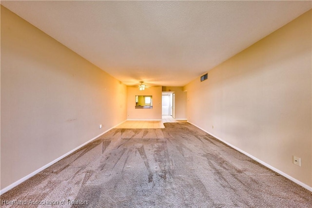2131 Lakeview Dr Unit 508, Sebring, FL 33870 - unfurnished living room featuring carpet floors and a ceiling fan