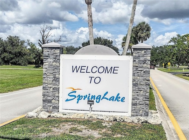 view of community sign