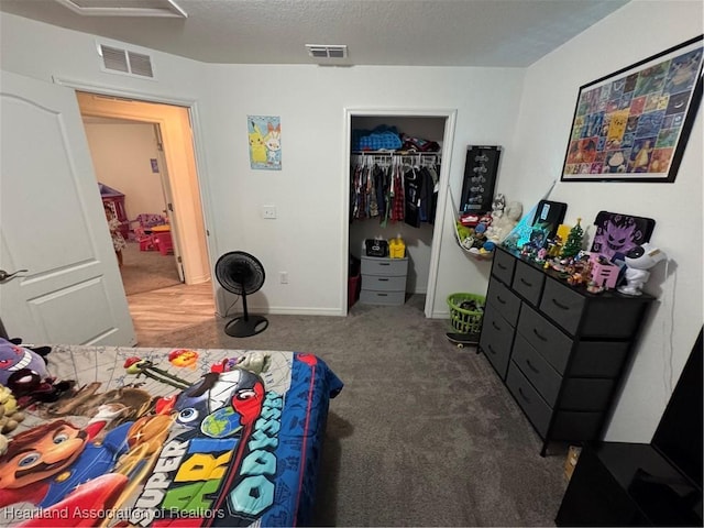 840 Palmetto Ave, Frostproof, FL 33843 - carpeted bedroom with a closet and a textured ceiling