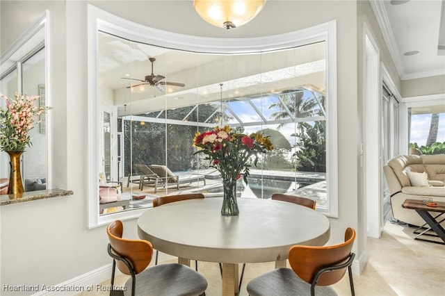 sunroom / solarium with ceiling fan