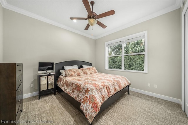 bedroom with ceiling fan and ornamental molding