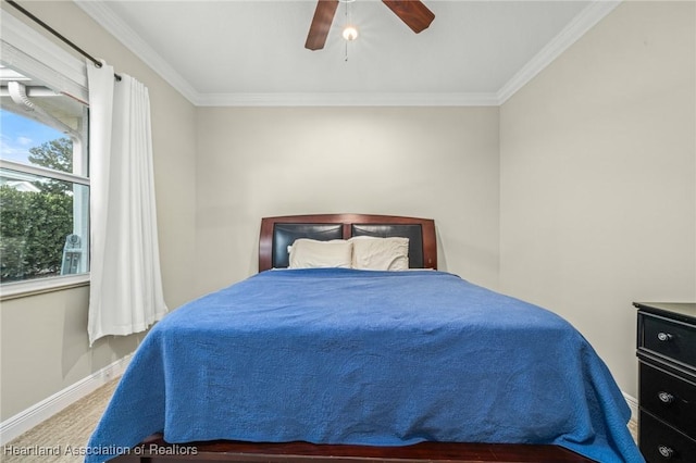 bedroom featuring ceiling fan and crown molding